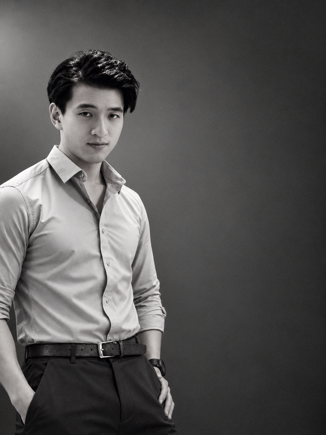 Three-quarter black-and-white portrait of Terrence Leung looking toward the camera.